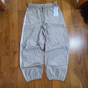 Athleta daybreak Track Pants with White Side Stripe
